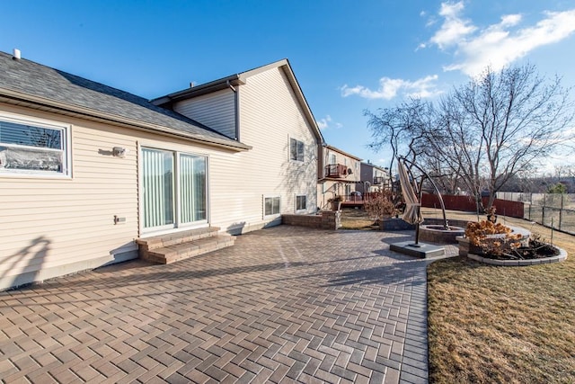 back of property featuring a patio area