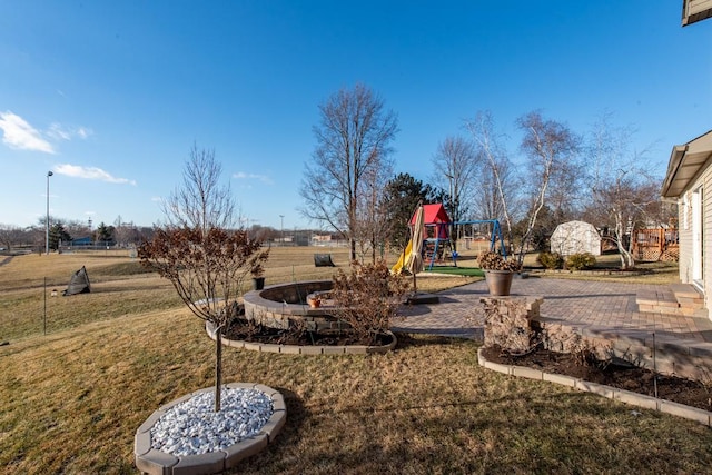 view of yard with a playground