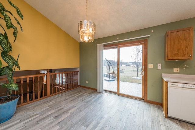 interior space with light hardwood / wood-style flooring, lofted ceiling, and a notable chandelier