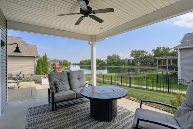 view of patio / terrace with a pergola, a water view, and ceiling fan