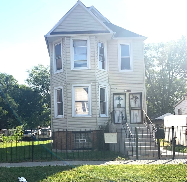 view of front of house featuring a front yard