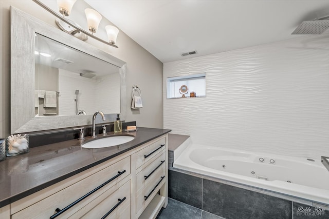 bathroom featuring vanity and separate shower and tub