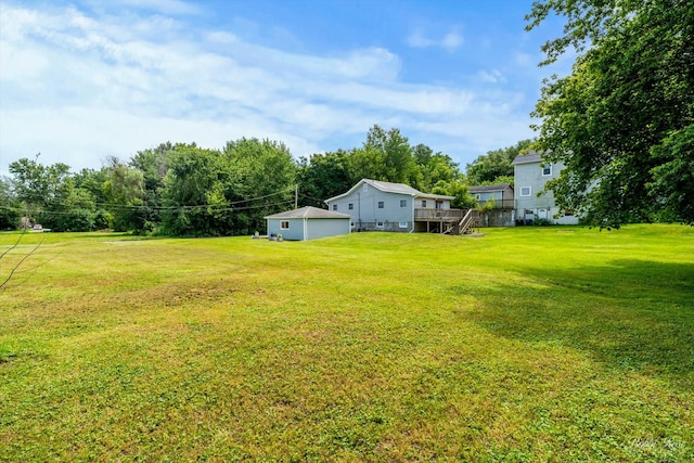 view of yard featuring a deck