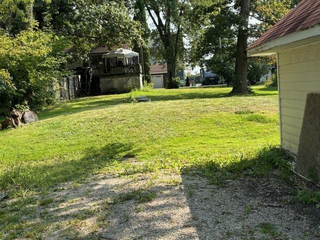 view of yard with a deck