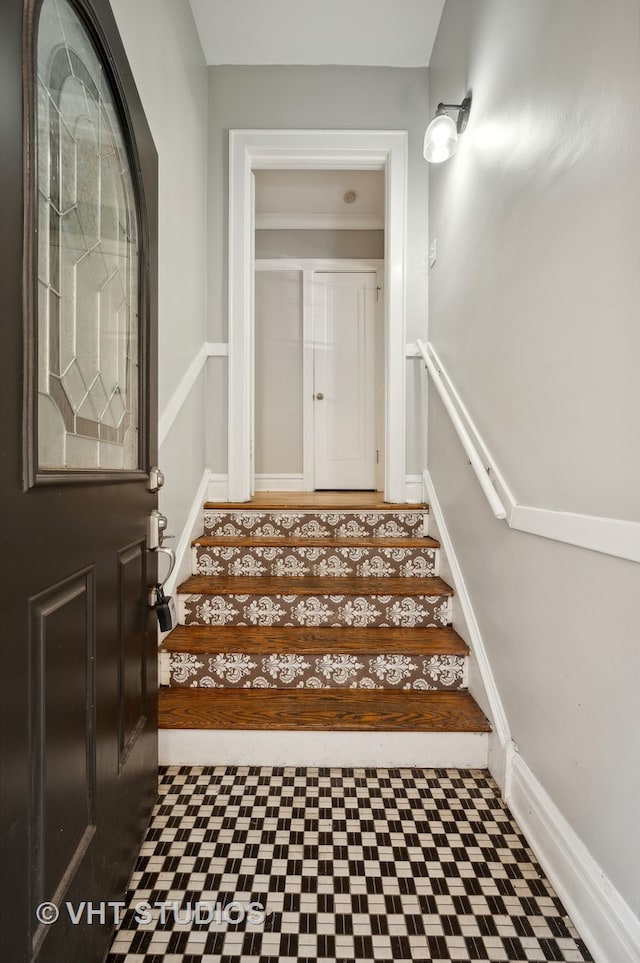 interior space featuring ornamental molding