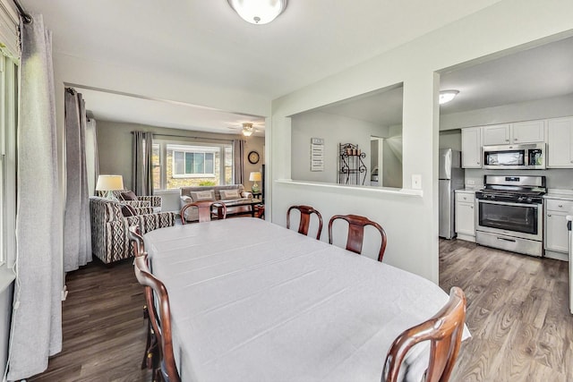 dining room with hardwood / wood-style floors