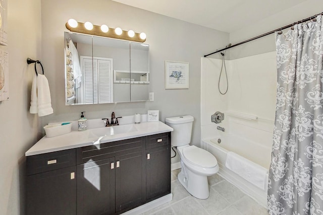 full bathroom with vanity, toilet, tile patterned flooring, and shower / bath combo