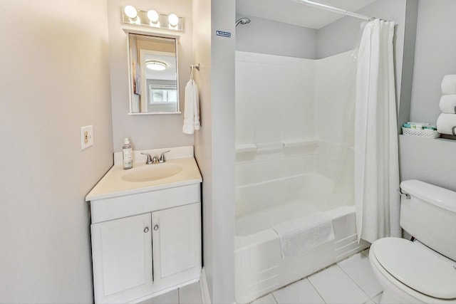 full bathroom featuring tile patterned floors, toilet, shower / bath combo with shower curtain, and vanity