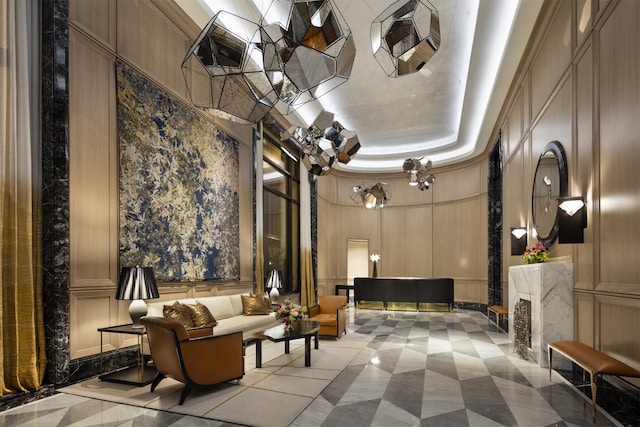 451 E Grand Ave Unit Ph66, Chicago, IL 60611 - building lobby featuring a decorative wall and a high ceiling
