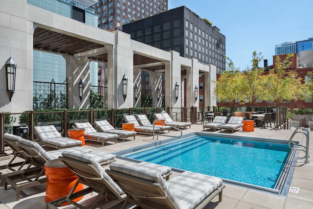 view of pool featuring a patio