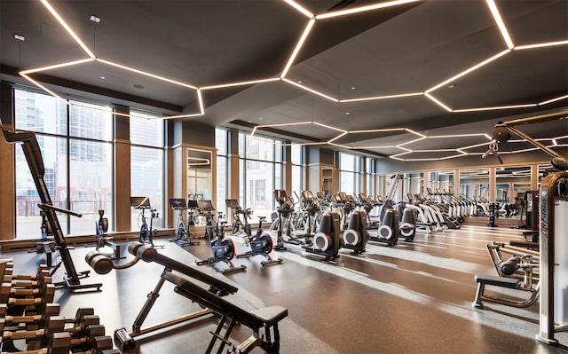 gym featuring floor to ceiling windows