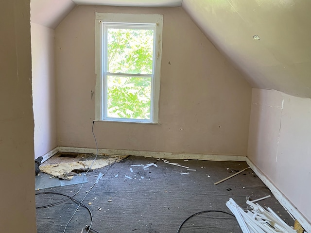 bonus room featuring lofted ceiling