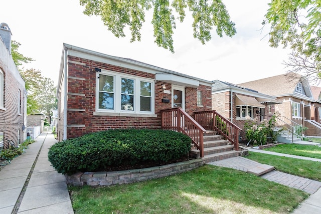 view of front of home with a front lawn