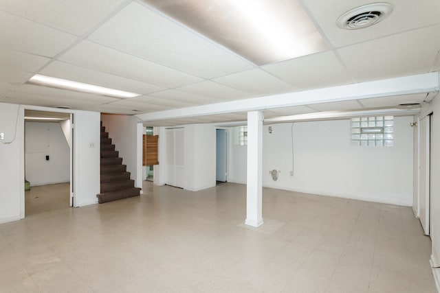 basement with a drop ceiling