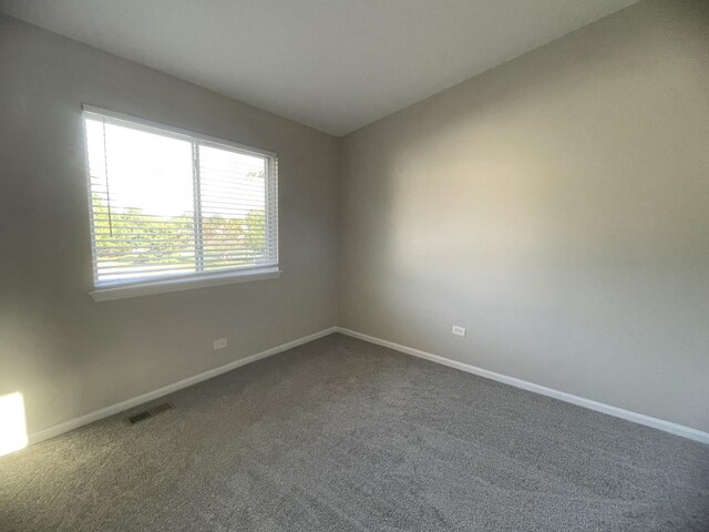 empty room with carpet floors