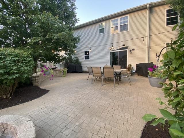 back of house with a patio area