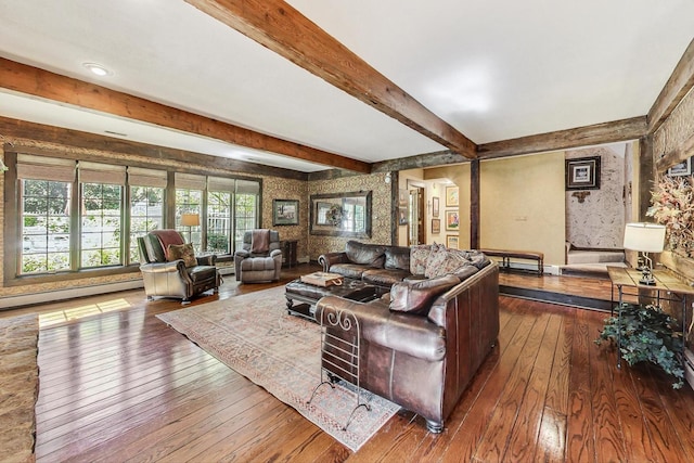 living room featuring baseboard heating, beamed ceiling, and dark wood-type flooring