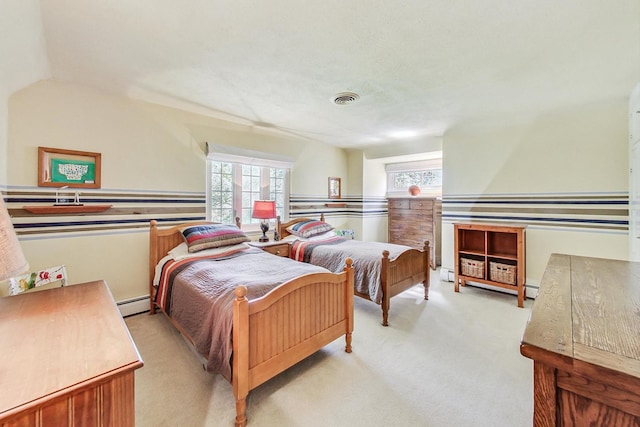 carpeted bedroom with lofted ceiling, multiple windows, and a baseboard radiator