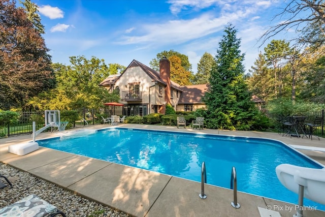 view of pool with a patio