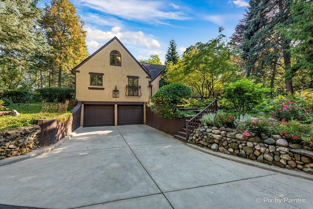 exterior space with a garage