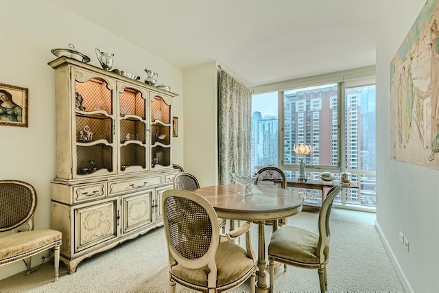 view of carpeted dining space