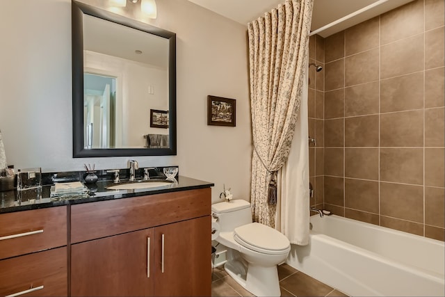 full bathroom featuring shower / tub combo with curtain, vanity, toilet, and tile patterned flooring