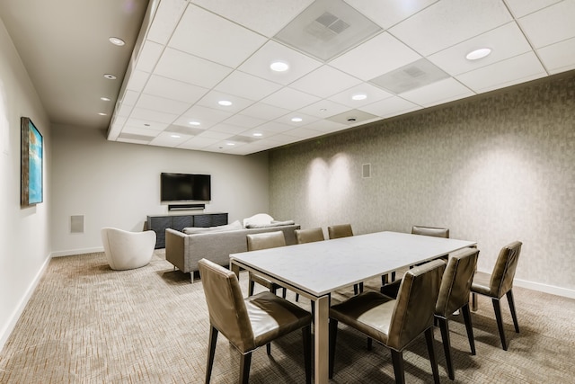 view of carpeted dining space