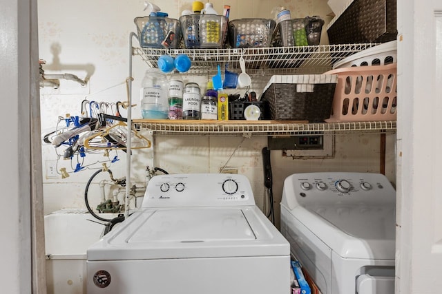 laundry area with washing machine and dryer