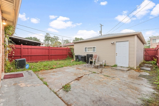 back of house featuring a patio and central AC unit