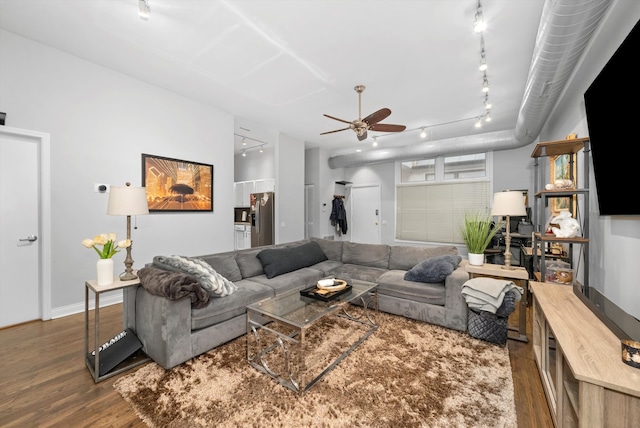 living room with ceiling fan, hardwood / wood-style floors, and track lighting