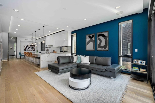 living room featuring light wood-type flooring