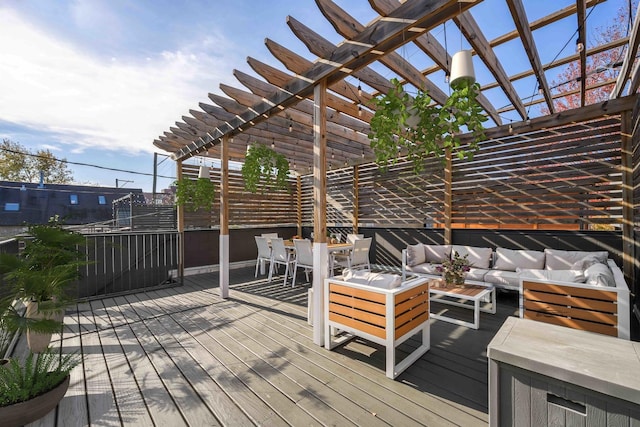 wooden terrace featuring an outdoor hangout area and a pergola