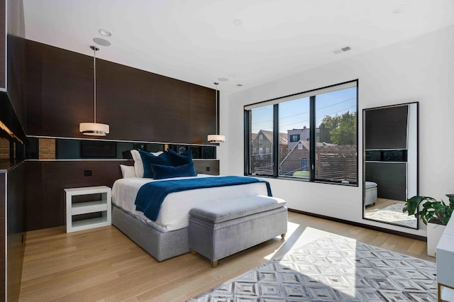 bedroom featuring light hardwood / wood-style flooring