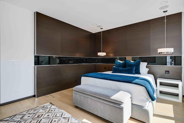 bedroom featuring light wood-type flooring