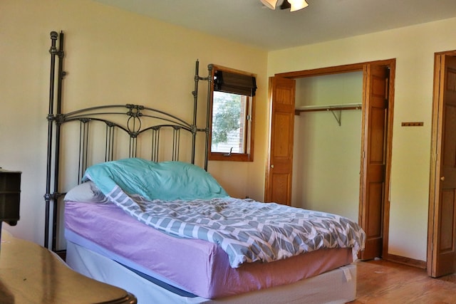 bedroom featuring a closet and hardwood / wood-style floors