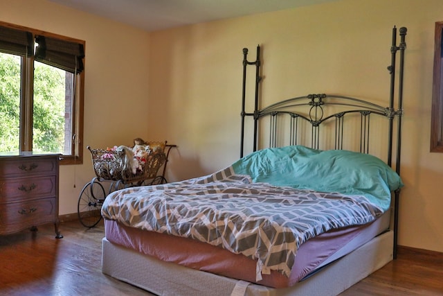 bedroom featuring hardwood / wood-style floors