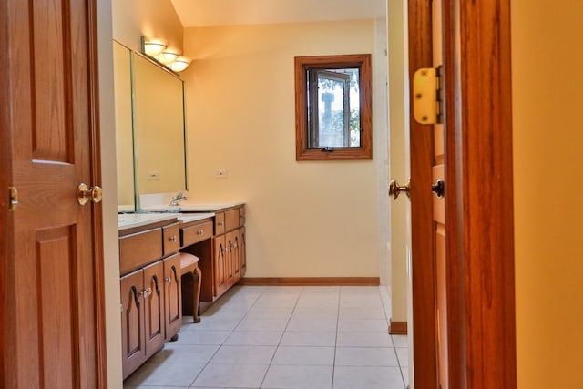 bathroom featuring vanity and tile patterned flooring