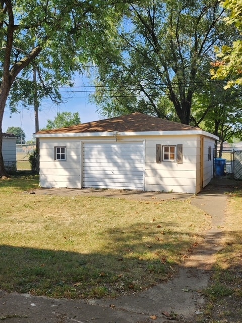 garage with a yard