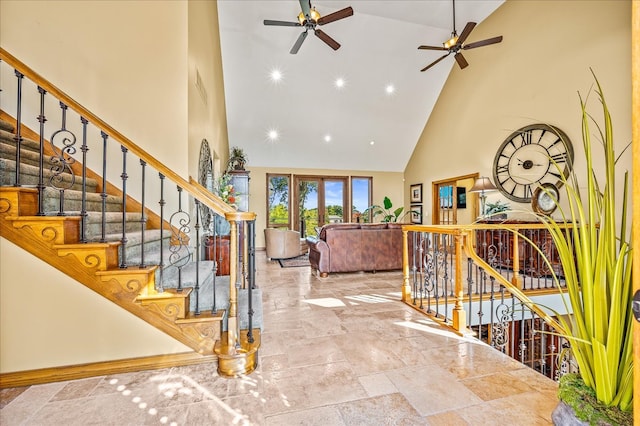 interior space with ceiling fan and high vaulted ceiling