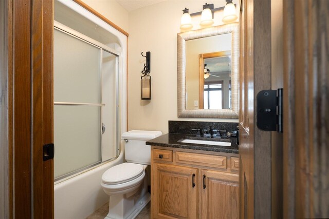 clothes washing area with ceiling fan, light tile patterned flooring, and washer and dryer