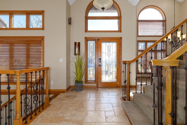 kitchen featuring a center island, a brick fireplace, hardwood / wood-style floors, appliances with stainless steel finishes, and sink