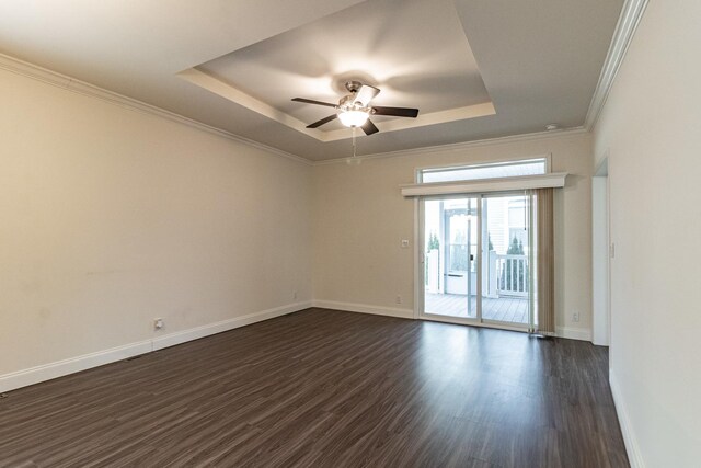 living room with crown molding, ceiling fan with notable chandelier, and dark hardwood / wood-style flooring