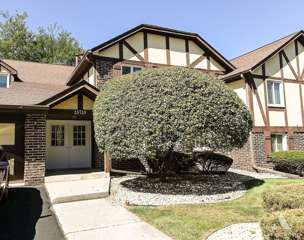 tudor house with french doors