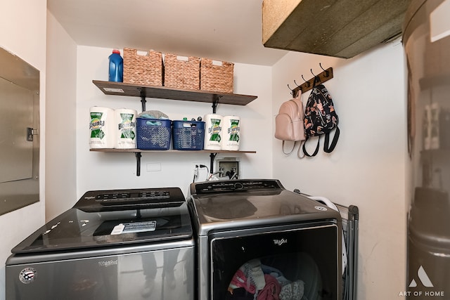 laundry area with independent washer and dryer