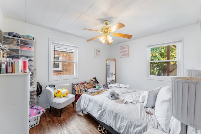 bedroom featuring ceiling fan and hardwood / wood-style flooring