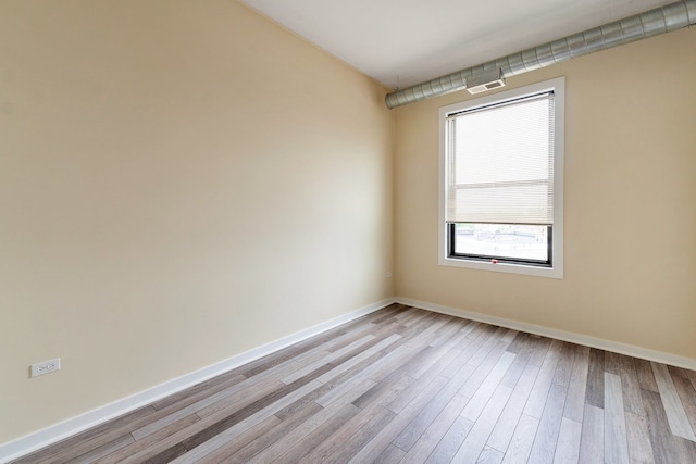 empty room featuring light hardwood / wood-style flooring