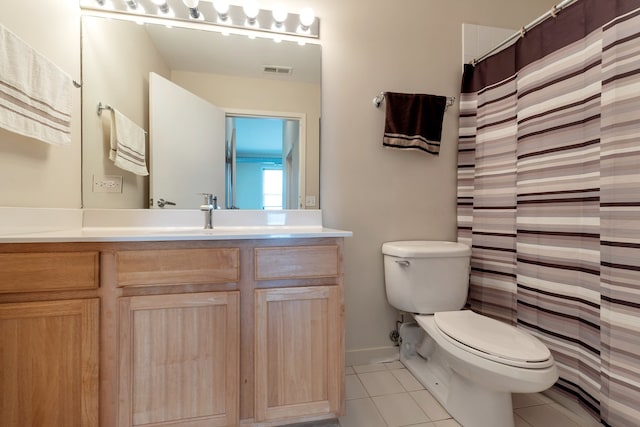 bathroom featuring tile patterned flooring, vanity, toilet, and a shower with curtain