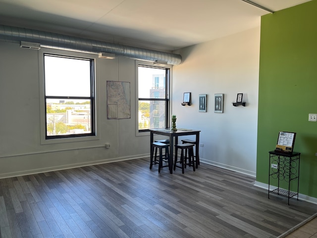 dining room featuring dark hardwood / wood-style flooring