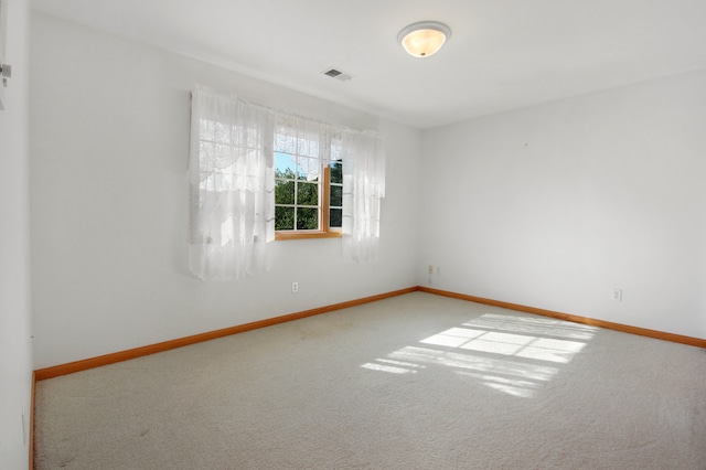 spare room with carpet flooring