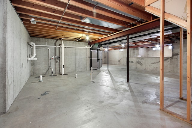 basement featuring heating unit